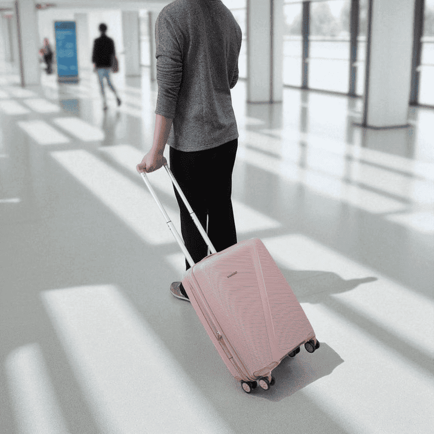 cara-melipat-baju-di-koper